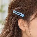 Pastel blue hair barrette in use-2.webp