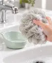 Esponja y cuenco menta en uso.webp