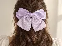 Lavender Rhinestone Bow on Brown Hair-2.webp