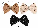 Measured trio of floral fabric bows-3.webp