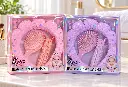 Cajas Spa rosa y lila en tocador-2.webp