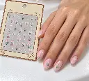 Uñas rosa pálido con tulipanes y lazos-2.webp
