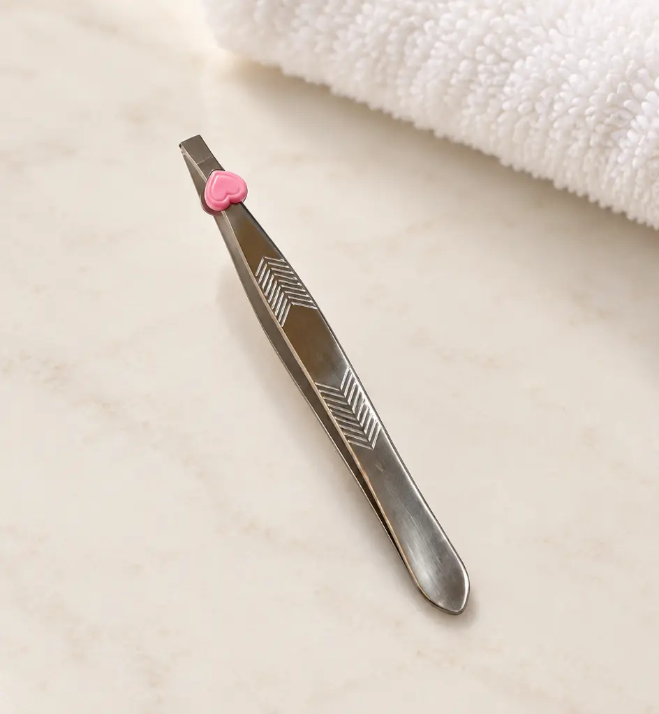 Silver Chevron Eyebrow Tweezers on Ivory Vanity-2.webp