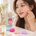 Heart makeup puff at a cream vanity-2.webp